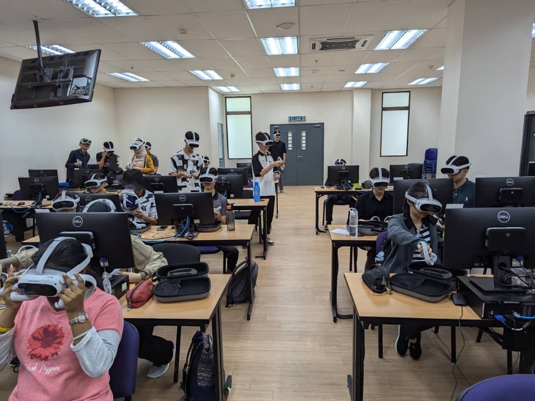 A classroom of learners using VR headsets and controllers